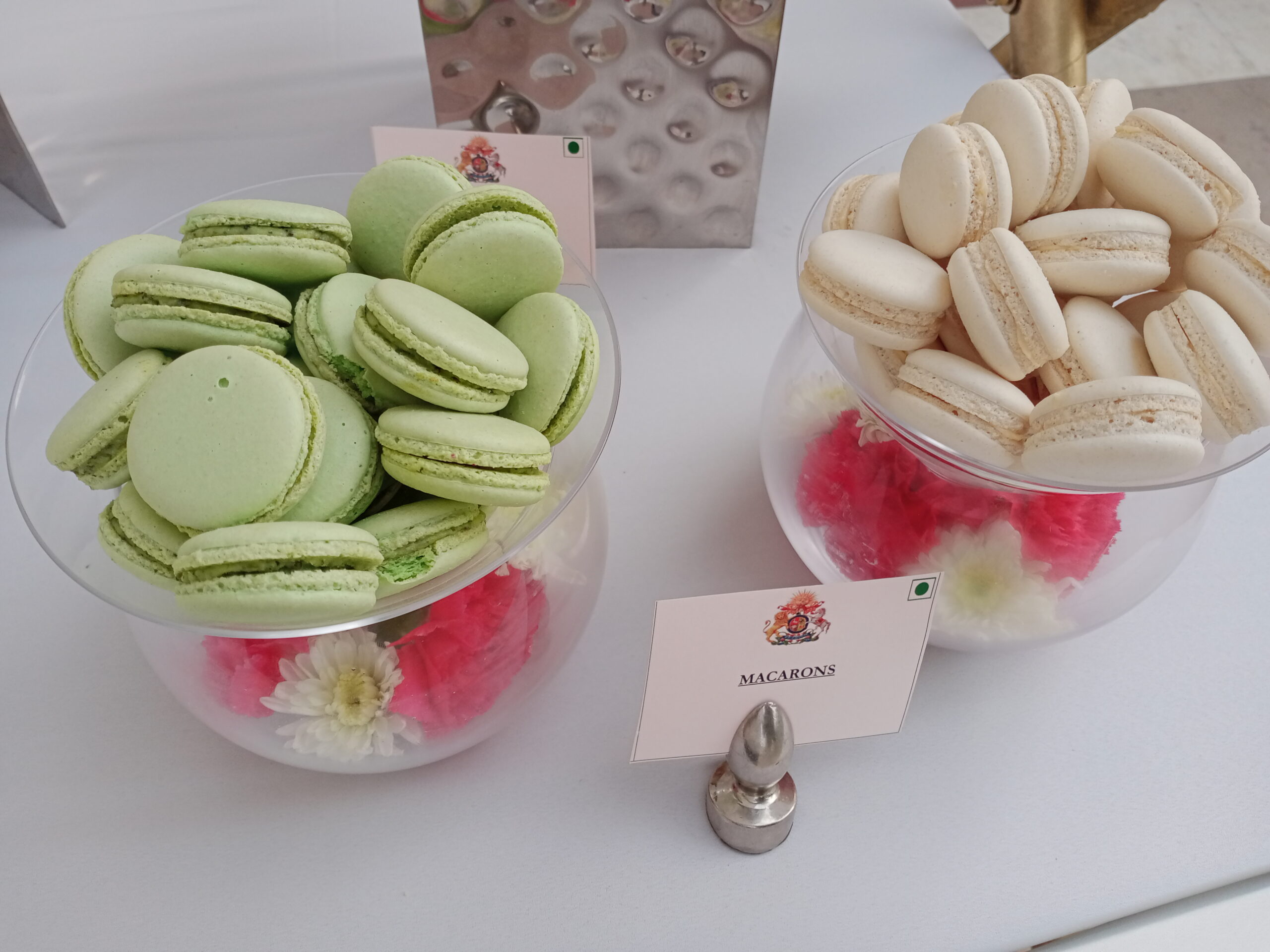 Pastel macarons at hotel pastry buffet display